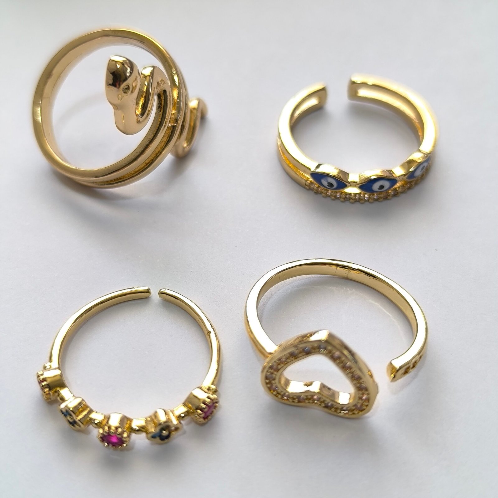 Anillos Dorados Surtidos con Cristales y Detalles | Set de 100 Piezas Modelos Variados Ajustables - Image 4