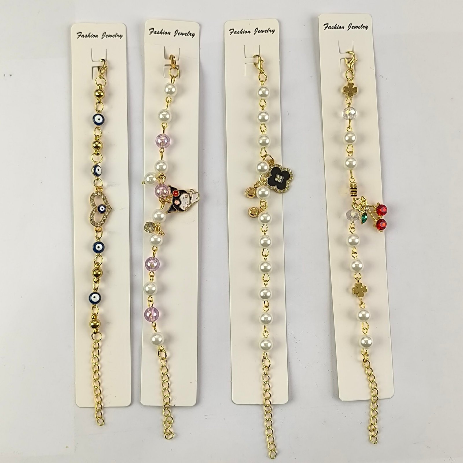 Pulseras con Perlas y Charms Colgantes Doradas para Mujer | Set 12 Piezas Modelos Surtidos con Dijes Kawaii, Ojo Turco y Cristales - Image 8