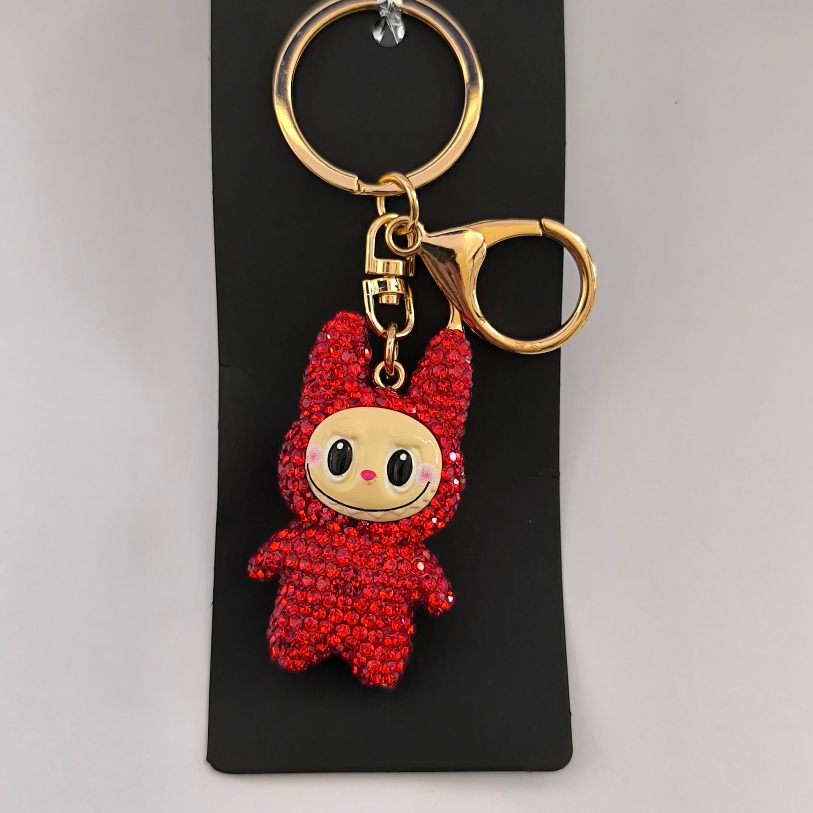 Llaveros Kawaii Brillantes Tipo Muñeco con Piedritas Tipo Cristal | Pack 12 Unidades Juveniles y Llamativos - Image 3