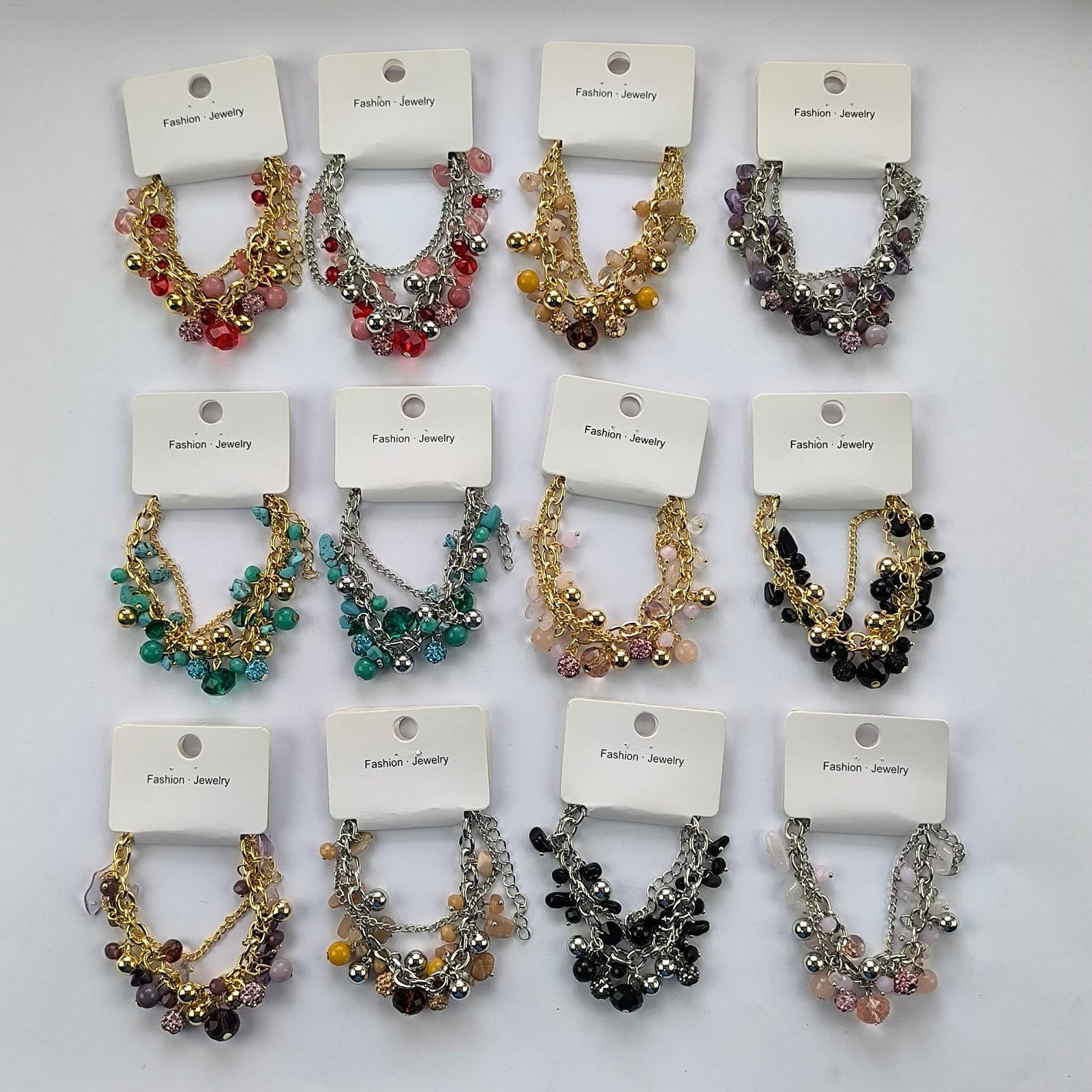 Pulseras tipo charm con cristones y perlas, ajustables dorado y plateado por docena. - Image 8